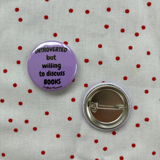 Button pin "Introverted but willing to discuss books"